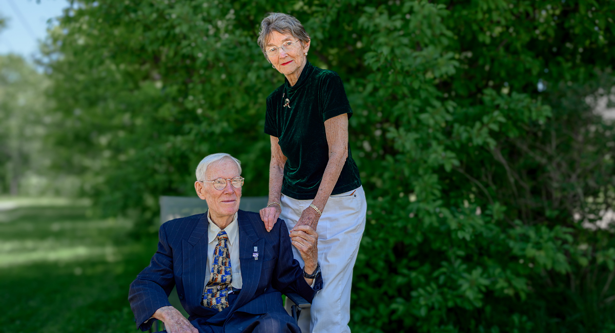 Dr. Jim Anderson and his wife Claire standing together outdoors